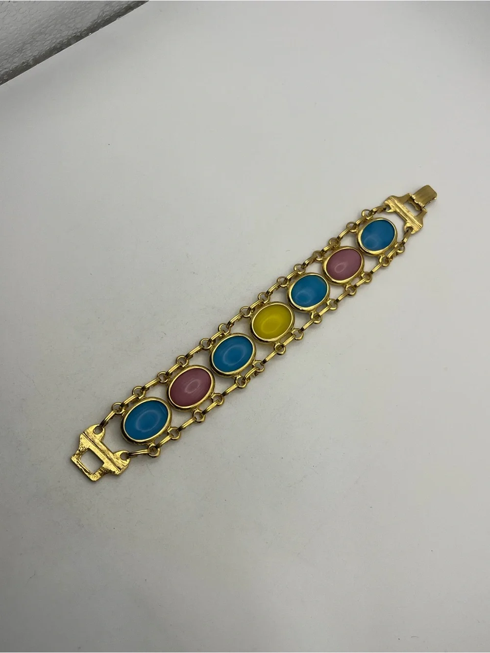 Pale Pink, blue, yellow oval cabochon gold tone vintage chain bracelet